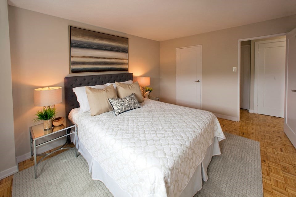 Silvercreek Towers in Georgetown, ON bedroom with hardwood flooring