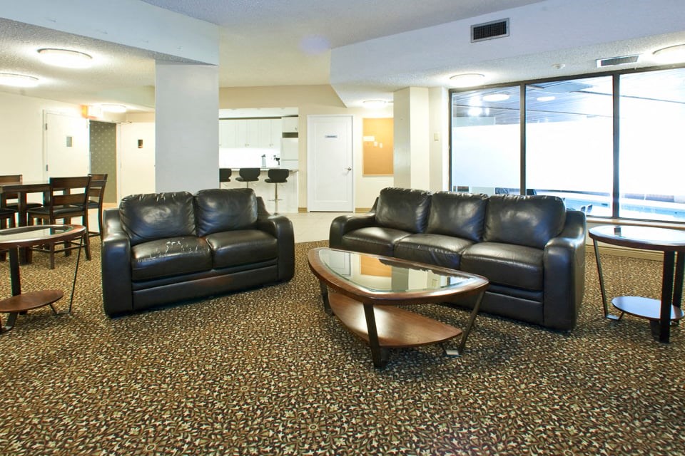 Springbank Apartments social room with couches in London, ON