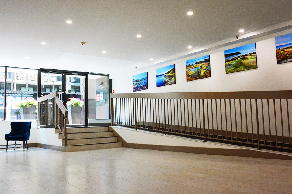 Surrey Village lobby entrance featuring ramp in Surrey, BC