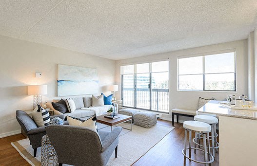 Surrey Village in Surrey, BC living room with access to balcony