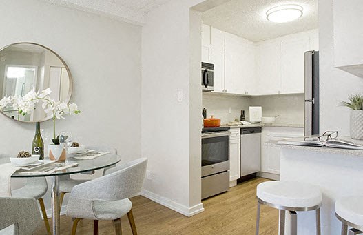 Surrey Village in Surrey, BC dining room and kitchen with breakfast bar