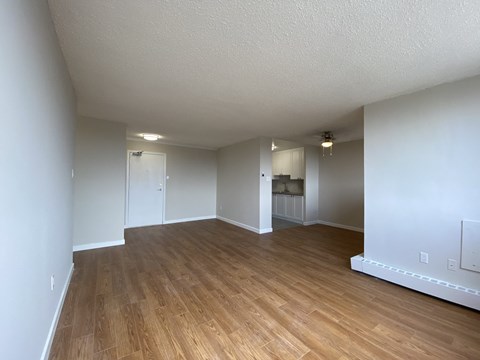 Living room at Tarawood Place in Peterborough, ON, looking towards entry and kitchen