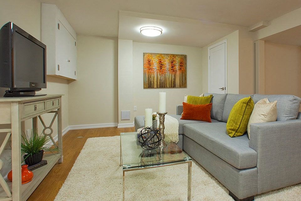 Taunton Terrace in Oshawa, ON modern social room with couch seating