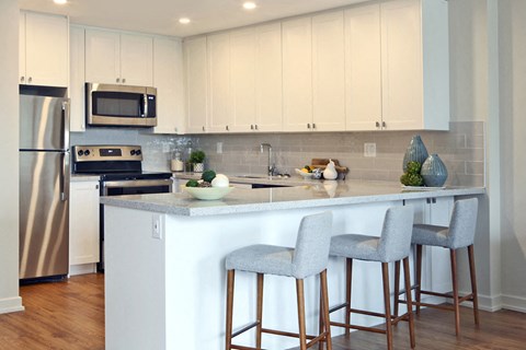 Testa Heights Apartments in Uxbridge, ON Kitchen featuring breakfast bar with extra seating