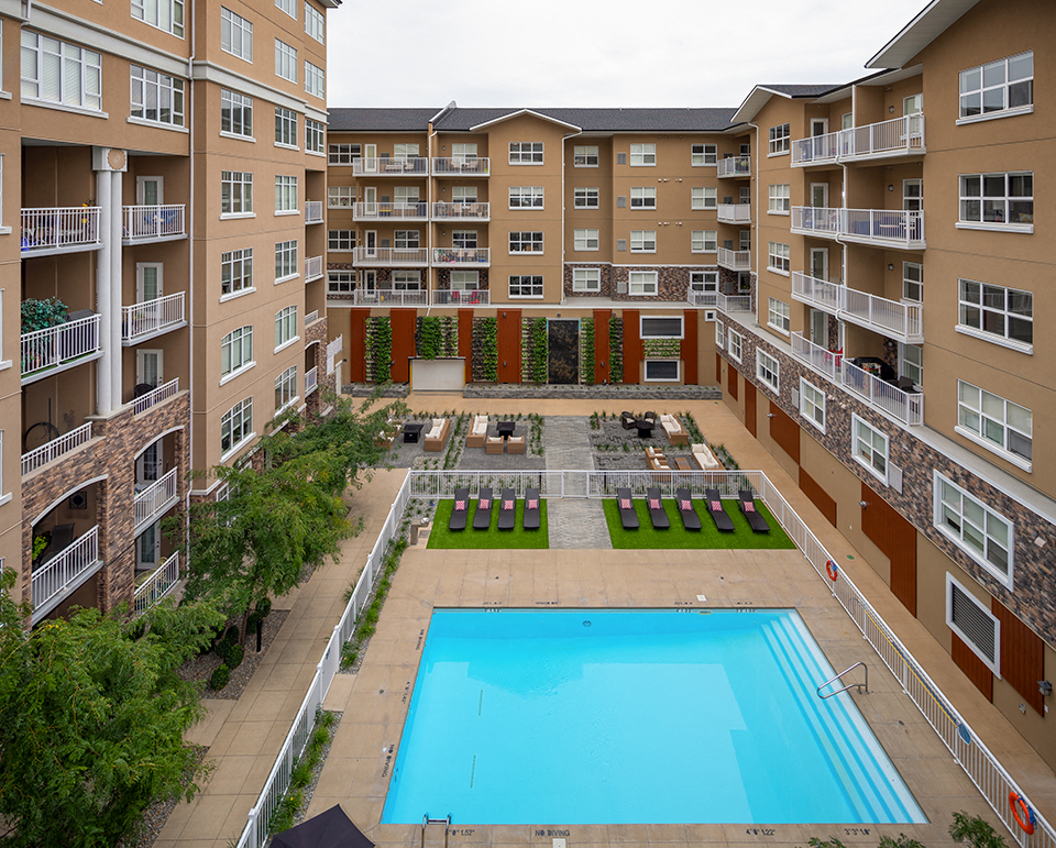 The Conservatory big courtyard with outdoor pool in Kelowna, BC