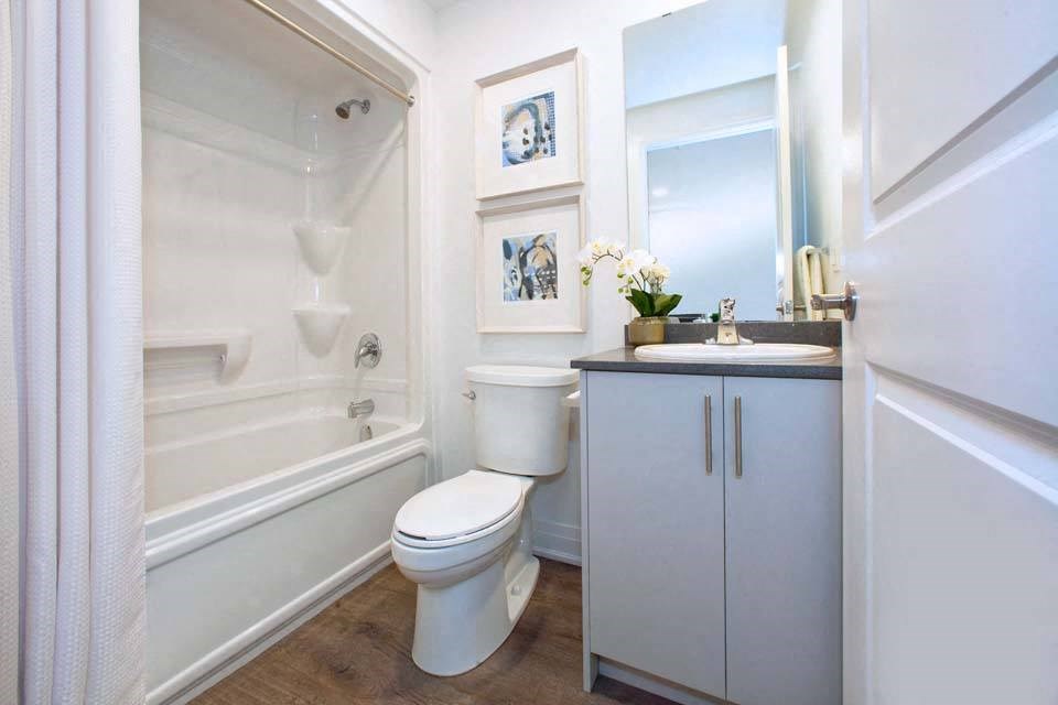 The Miltonian Apartments bathroom featuring tub shower in Milton, ON