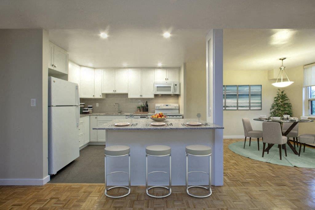 The Parkwood kitchen with built-in breakfast bar in Bellville, ON