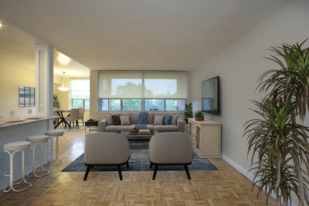 The Parkwood large living room with hardwood flooring in Bellville, ON