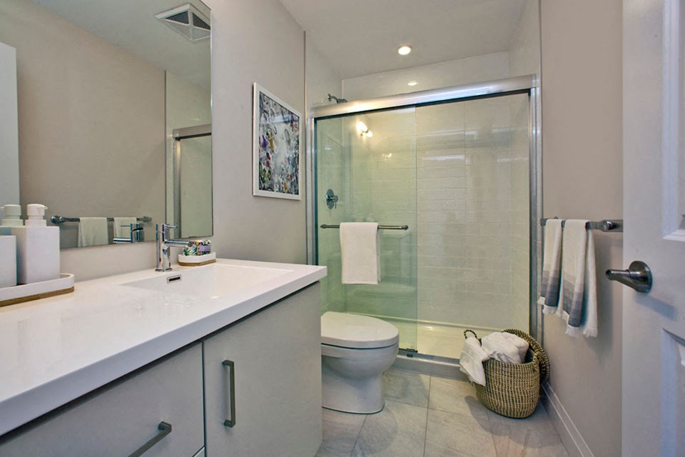 The Taunton in Oakville, ON bathroom with stand up shower and designer cabinetry