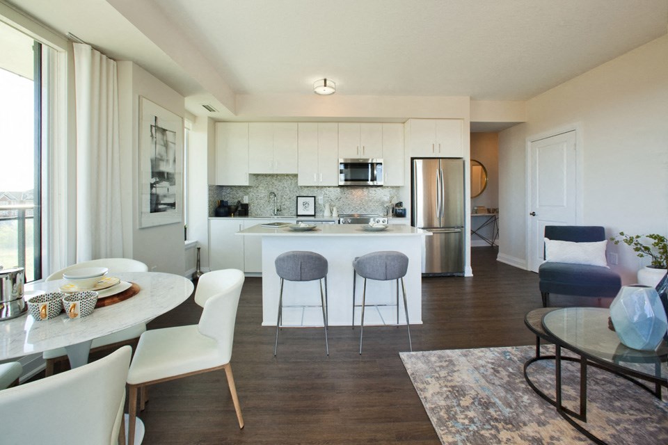 The Taunton in Oakville, ON dining room and kitchen with luxury wide plank flooring