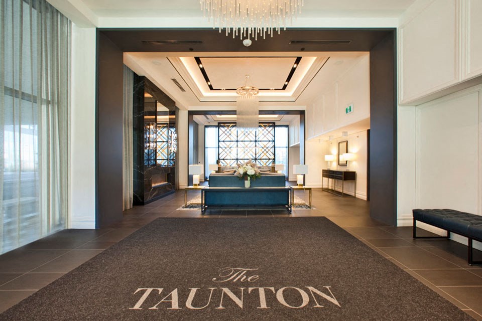 The Taunton in Oakville, ON lobby entrance and concierge desk