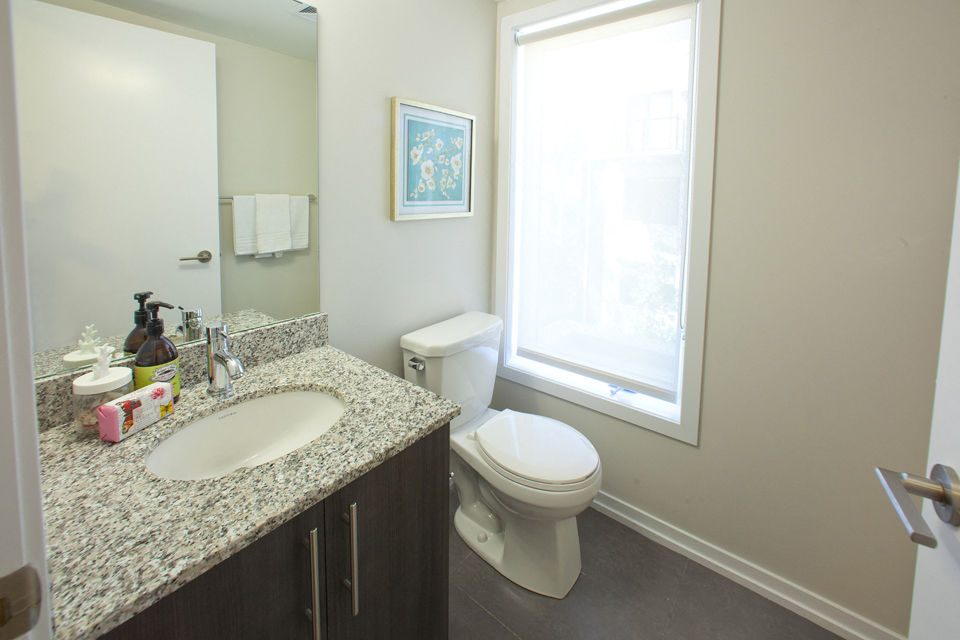 Towns on the Ravine Half bathroom with sink and toilet