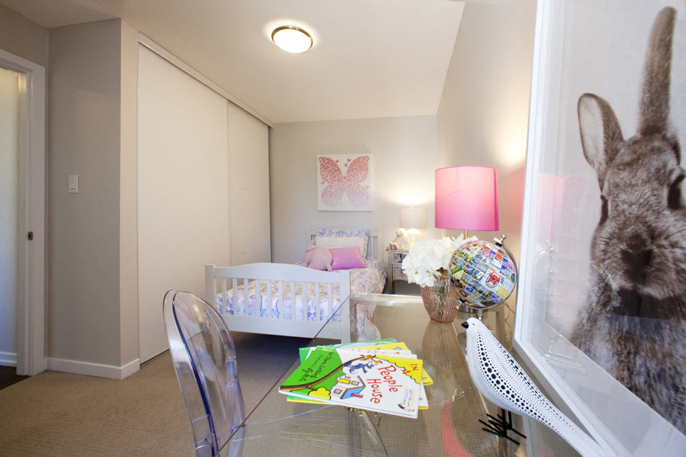 Towns on the Ravine Bedroom with a pink butterfly painting