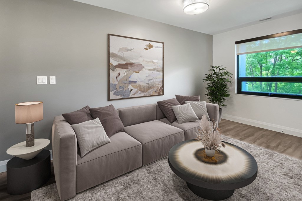 a living room with a couch at Trio on Belmont in Kitchener ON