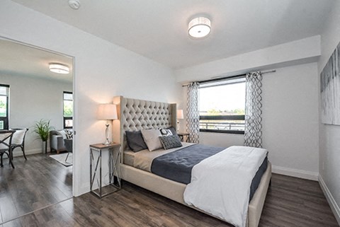 Trio On Belmont bedroom with luxury plank flooring in Kitchener, ON