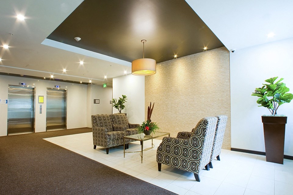 Lobby with seating area located in Building A at Trio on Belmont in Kitchener, ON