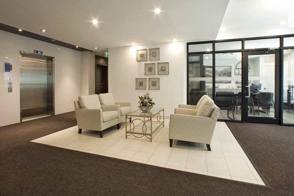 Trio On Belmont lobby with seating area in Kitchener, ON