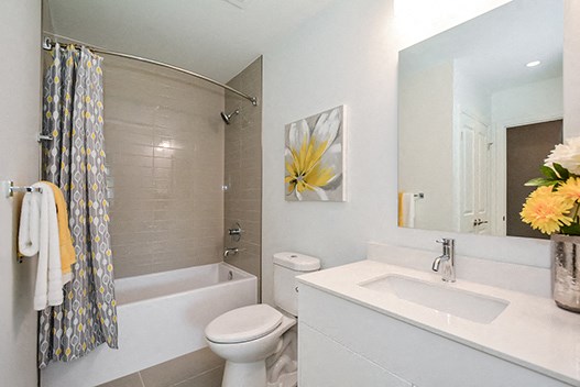 Trio On Belmont modern bathroom with full size bathtub in Kitchener, ON