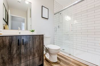 Main bathroom with a walk-in shower in a 2 bedroom 2 bathroom Variation C floor plan at Vale Station Apartments in Waterloo, Ontario