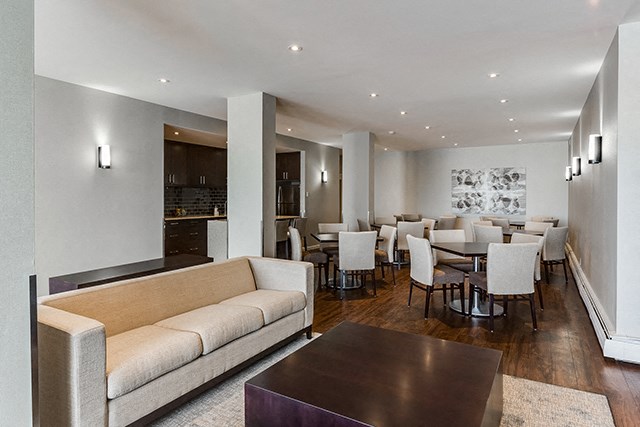 Victoria Place social room with comfortable couch seating area in Saskatoon, SK