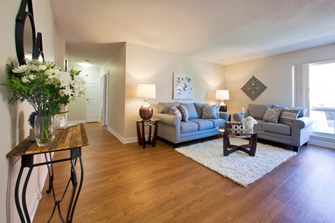 a living room with a couch and a table