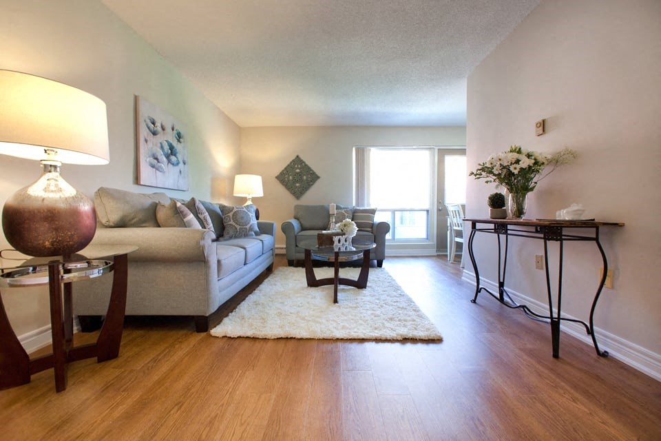 London Road Apartments living room with access to balcony in Sarnia, ON