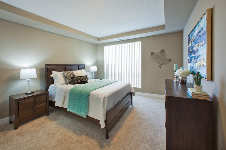Juliana Place Apartments bedroom featuring large window in Woodstock, ON