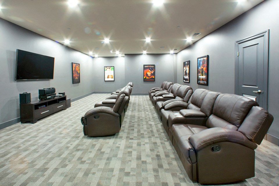 Juliana Place Apartments theater featuring reclining seating in Woodstock, ON