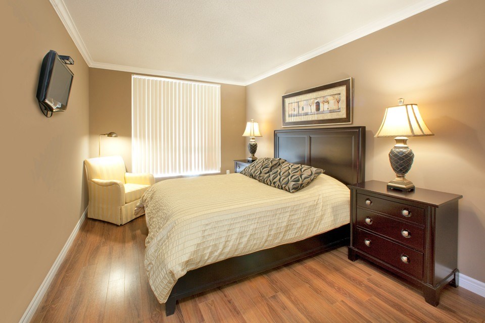 Building 505 guest suite sleeping area with Queen size bed