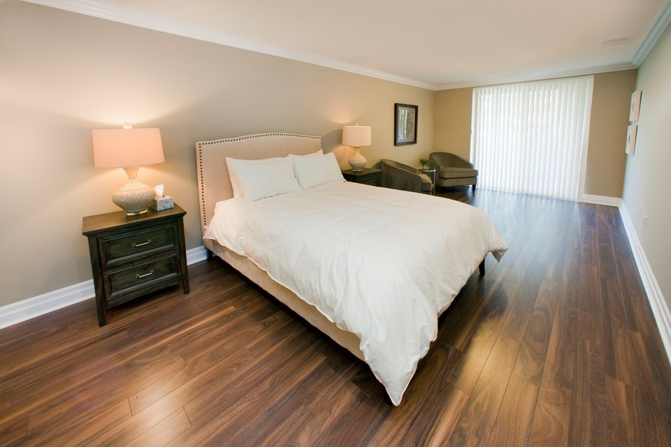 Building 515 guest suite sleeping area with Queen size bed