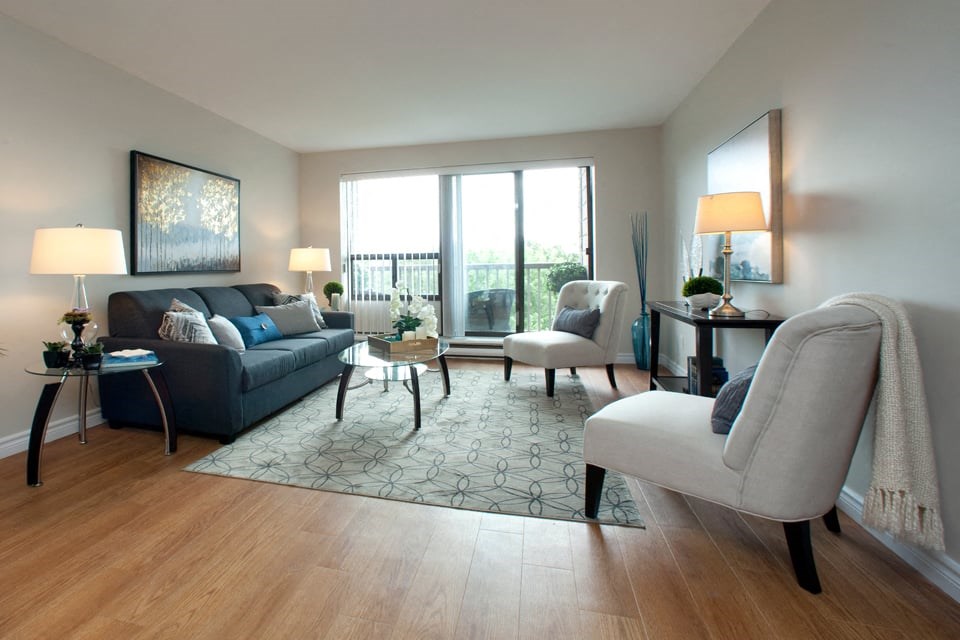 Pembridge Square bright, open living room with hard surface flooring in Kingston, ON