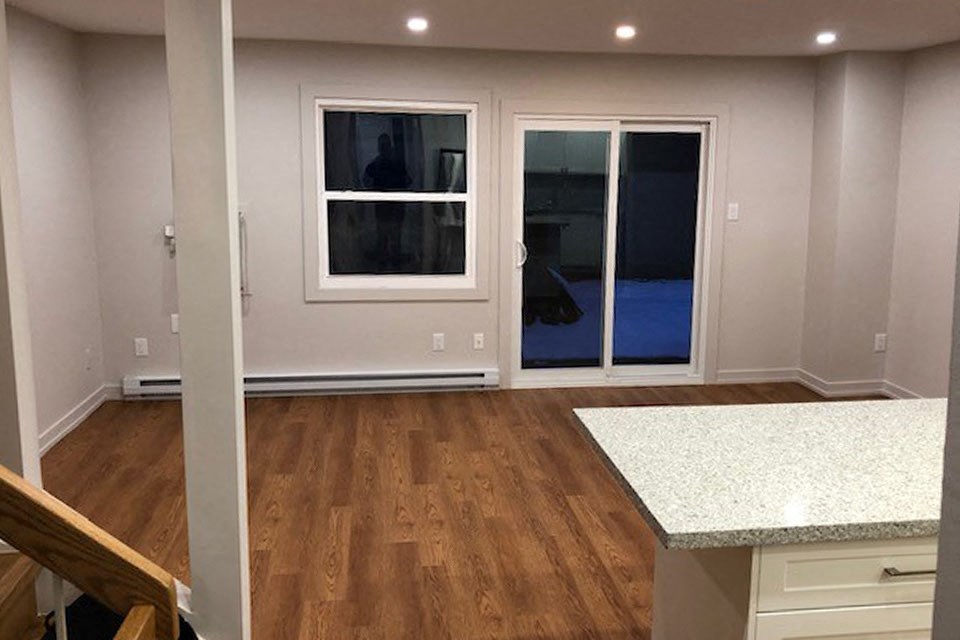 Waterford Townhouses in Mississauga, ON spacious living room with access to backyard