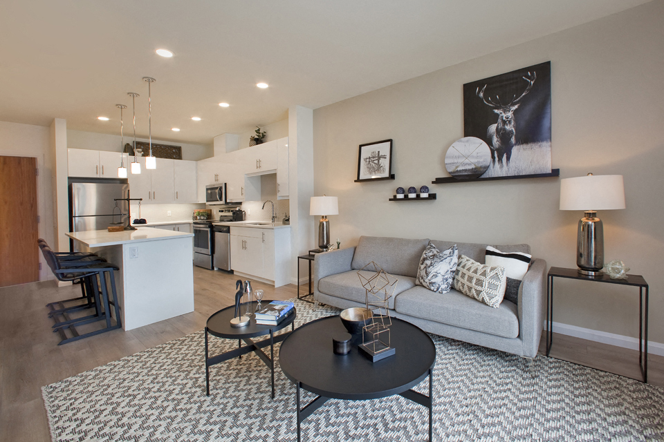 a living room with a couch and a table