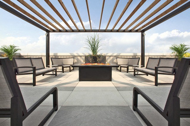 Watson Park Apartments roof top terrace featuring lounge seating and gazebo in Guelph, ON