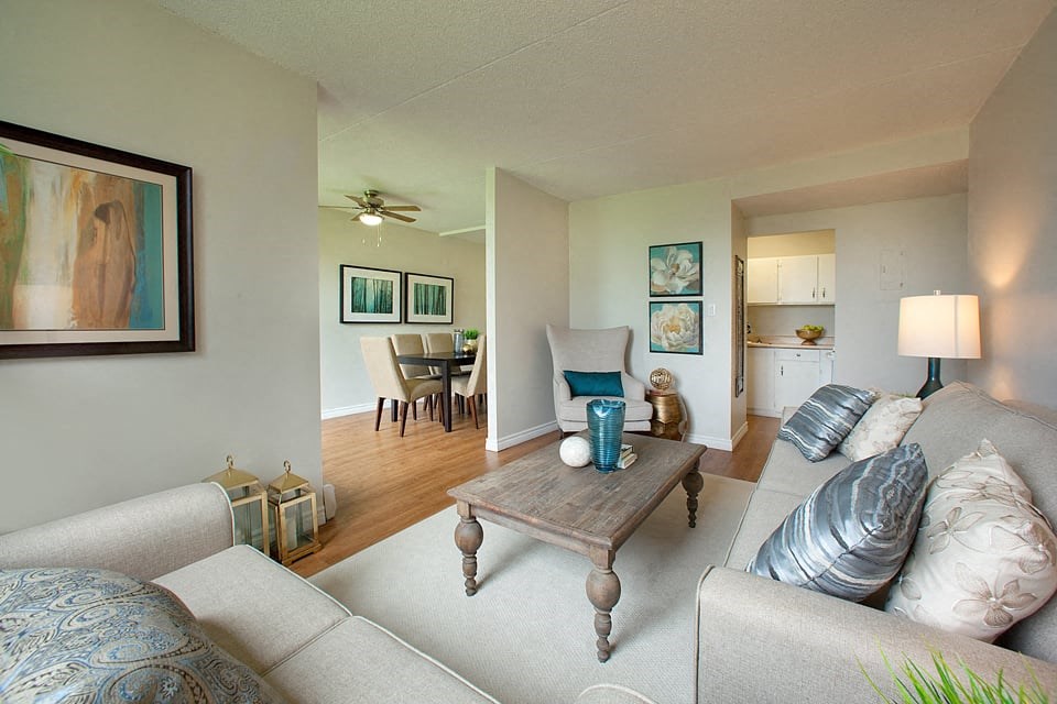 Squire Court living room with view into dining room in ST. Catharines, ON