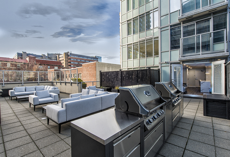 Wesley Place in Vancouver, BC Outdoor patio with shared BBQ grill
