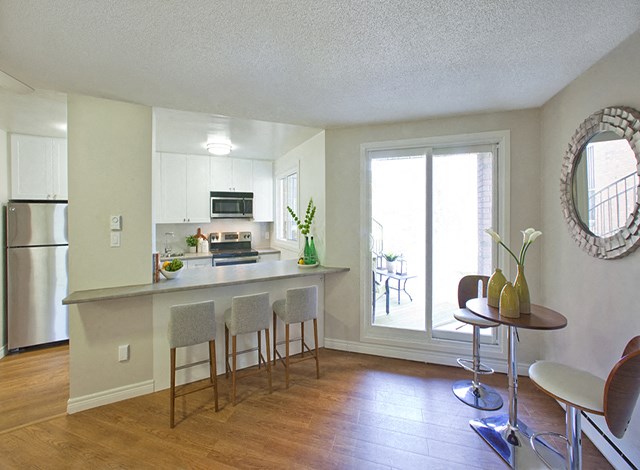 Whitby Place in Whitby, ON living room access to private balcony