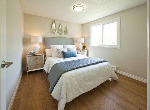 Whitby Place in Whitby, ON brightly lit bedroom with window