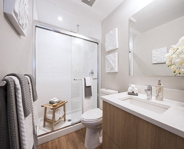 Yello On Yates sleek, modern bathroom with standing shower in Victoria, BC