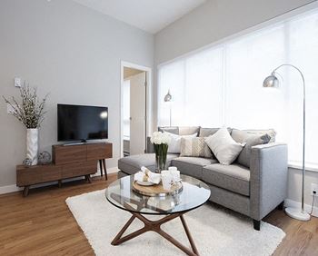 a living room with a couch and a table