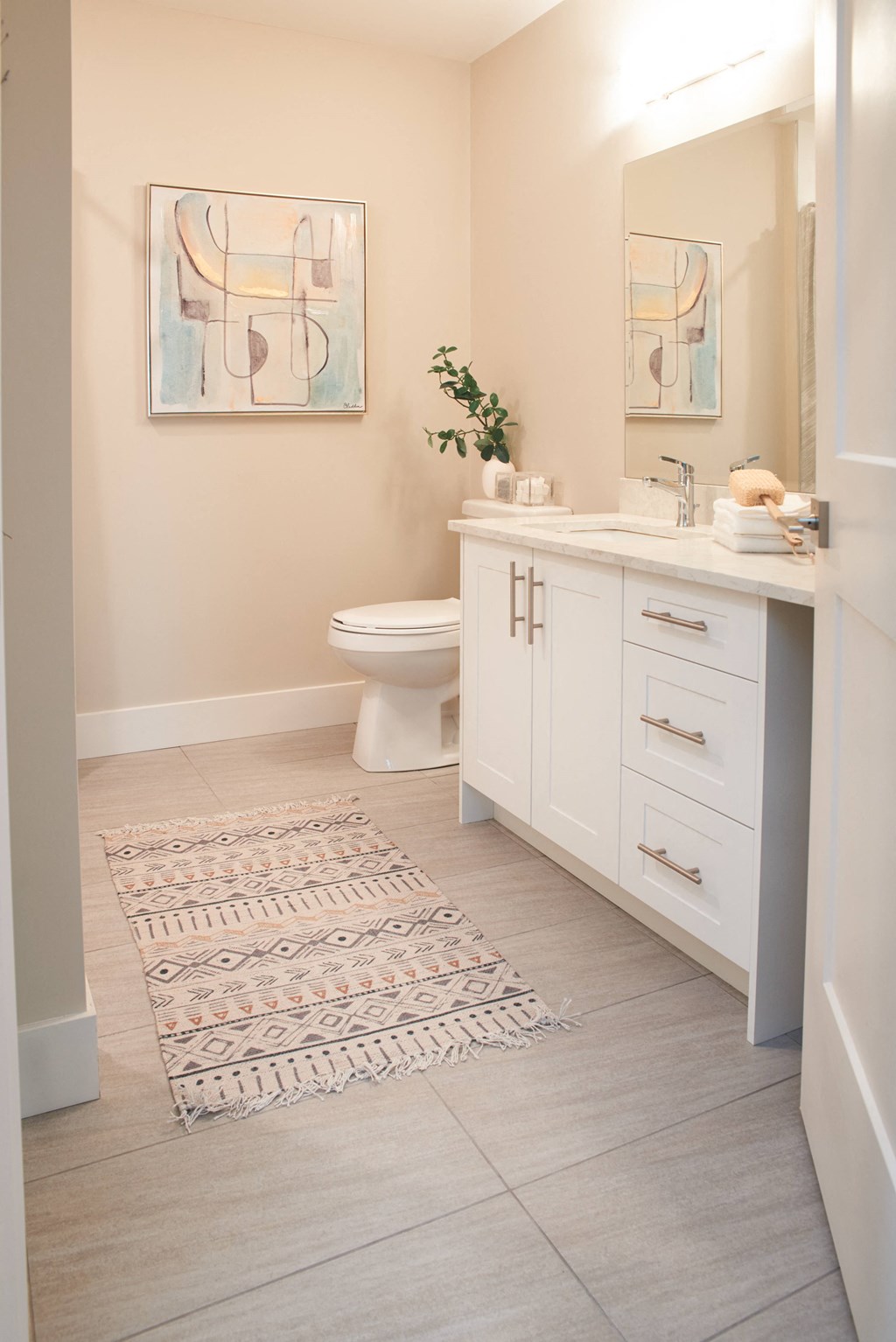 The Cliffs at Dellridge featuring a modern bathroom with large vanity, walk in shower and plenty of storage in Bedford, NS