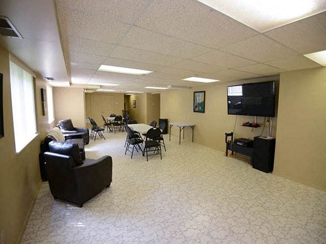 Dalhousie Place social room with couch seating area in Amherstburg, ON