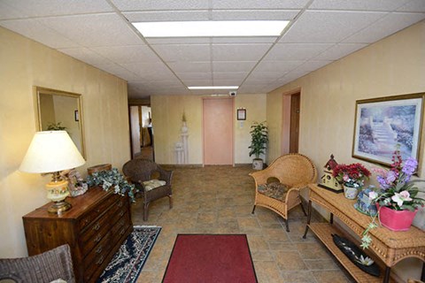 a living room with furniture and a table