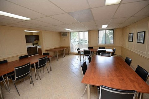 Pickering Towers social room with access to kitchen in Amherstburg, ON