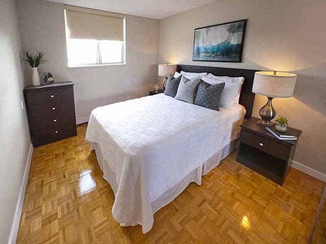 Highpoint Barrie Modern bedroom that is well lit by the window in Barrie, ON