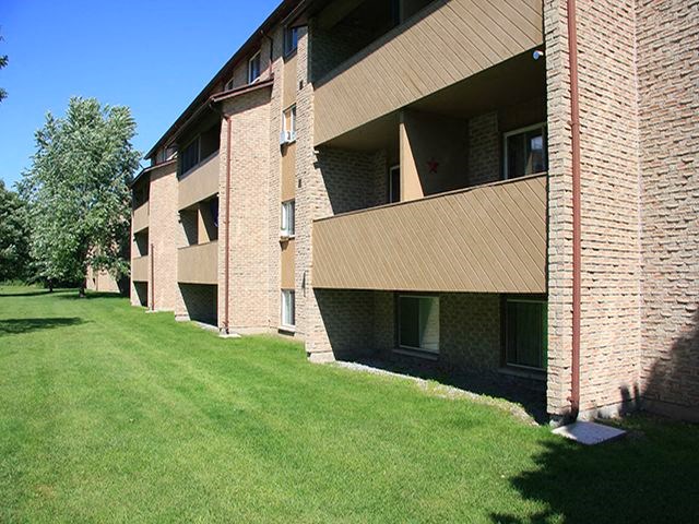 Kensington Apartments in Brockville, ON exterior of back of building suites with balconies