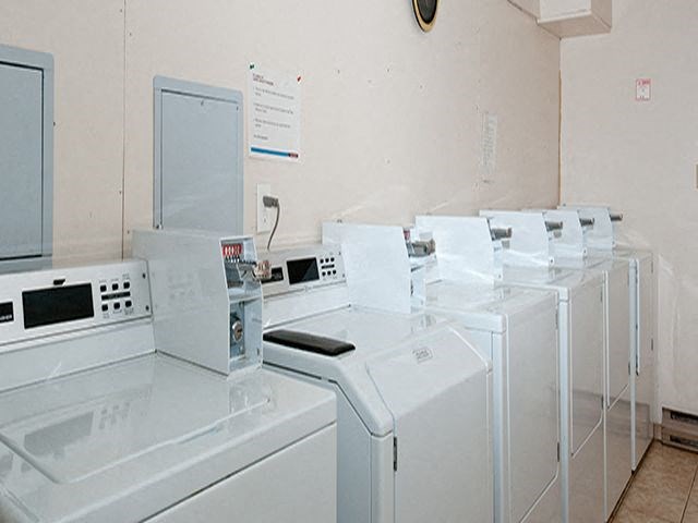 Kensington Apartments shared laundry room in Brockville, ON