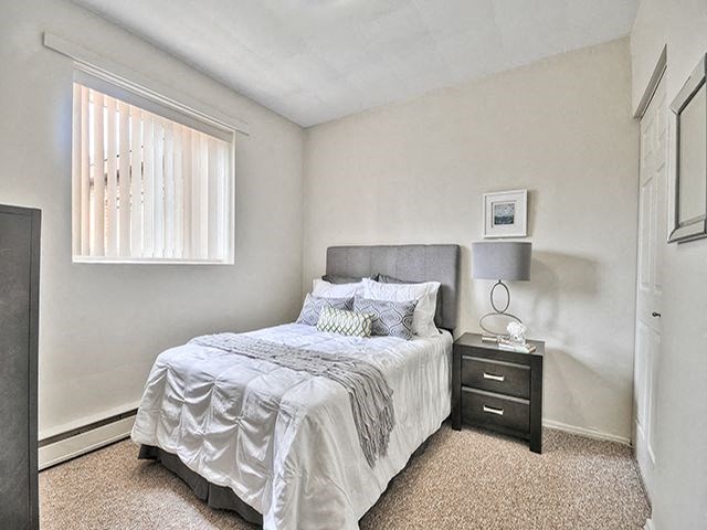 Brockville Apartments in Brockville, ON well lit bedroom