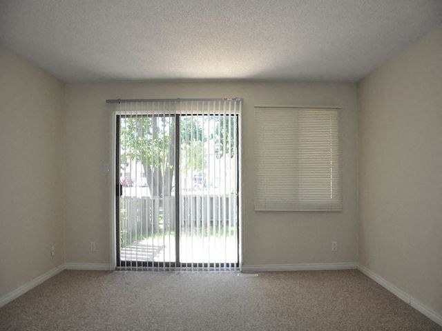 Willowbrook Estates in Brooks, AB backroom with access to backyard