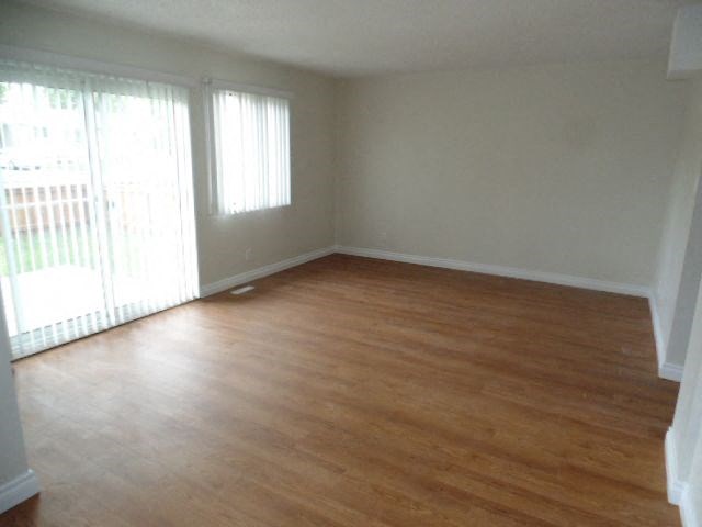 Willowbrook Estates in Brooks, AB living room with access to backyard